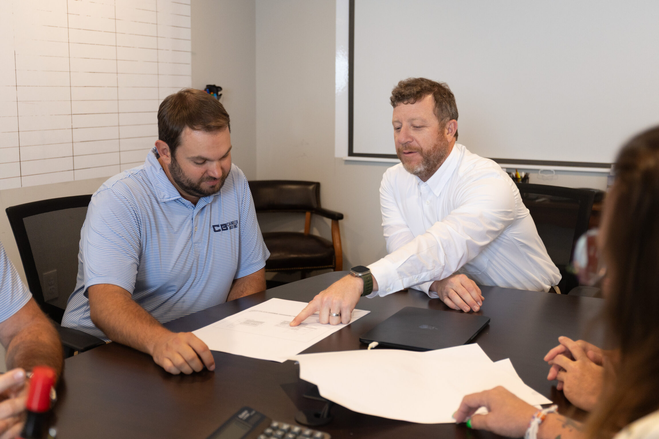 CB Chandler team discussion commercial project